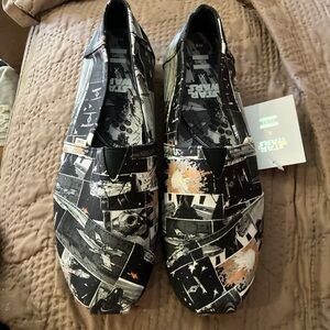 TOMS Black Star Wars Graphic Slip-On Loafers with Orange Accents